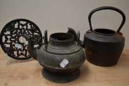 A 19th Century bronzed metal kettle, of Eastern design with missing handle, measuring 16cm high,
