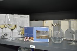 An assortment of boxed glasses including six Amaris crystal wine glasses.