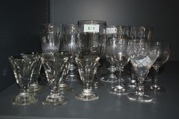 Nine vintage spirit glasses sold with five liqueur glasses and a small selection of etched glasses.