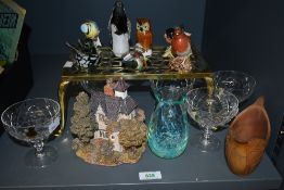 Five Webb Corbett Crystal champagne glasses, a green Caithness style vase, a Lilliput Lane cottage