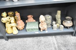 An interesting collection of 20th century South American clay figures, largest 29cm, sold together