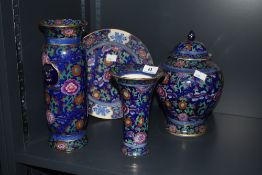 A collection of four Jacobean Booths pottery to include a wall plaque, h23cm, ginger jar, h24cm,