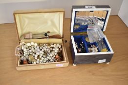 A beige velvet jewellery box, containing various bead necklaces, hat pins, brooches etc and sold