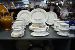 A collection of Royal Worcester fine bone china, decorated with floral patterns within a gilt