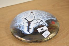 A mid century John Ditchfield 'glasform' iridescent paperweight of flattend circular form, signature