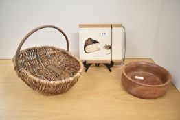 A tiled top cheese board depicting small rodent nibbling cheese, 21cm, sold together with a wicker