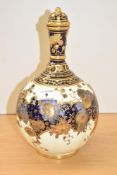 A Royal Crown Derby bone china lidded vase, of lobed globular form with slender moulded neck and