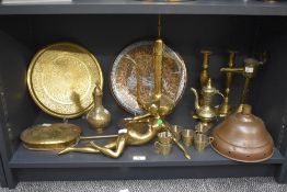 A large quantity of late 19th / early 20th century ornate brass and copper table ware, to include an