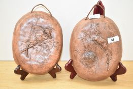 A pair of mid 20th century wall plaques depicting doormouse and harvest mouse, inscribed to the