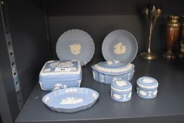 A collection of Wedgwood Jasperware blue and white pottery, to include pin dishes, trinket boxes,