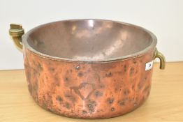 A antique copper bain marie chocolate basin, with brass fittings. Height 14cm, width 31cm.