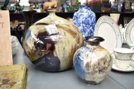 A large 20th century earthware glazed vase, 26cm, sold together with a similar vase, makers label to
