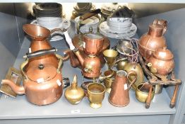 A large group of late 19th century / early 20th century brass and copper ware, to include an unusual