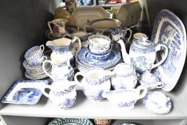 A good collection of blue and white fine bone china, to include Willow Wedgwood, Mintons, Stone,