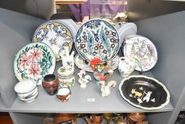 A collection of mid-century Portuguese pottery, to include a cockerel, h12, a plaque and large