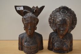 Two attractive Balinese carved hardwood busts, each with elaborate headdress, appears to be a