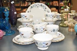 Twenty one pieces of Colclough bone china tea wares, comprising six cups, six saucers, six side