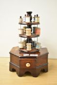 A late 19th / early 20th century bobbin stand of octagonal form, h31cm.