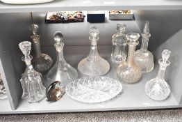 A good selection of 20th century cut glass decanters, to include a Waterford style decanter with