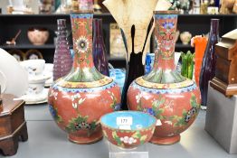 A pair of early 20th century middle eastern brass belly vases, finely hand crafted with