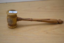 An early 20th century olive wood Masonic gavel, with carved Masonic emblem and marked Jerusalem