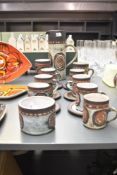 A group of mid-century Briglin studio pottery, comprising tea cups, saucer and pitcher, impressed