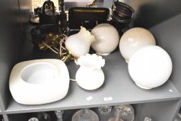 A mid-century brass wall lamp with tulip glass shade, 27cm, sold together with another tulip