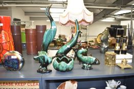 A collection of six Blue Mountain Canada pottery figures to include lotus flower bowl, flying