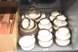 An antique Diamond bone china tea set , approx. 40 pieces.