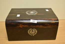 A 19th century coromandel wood vanity box decorated with mother of pearl, inside lined with purple