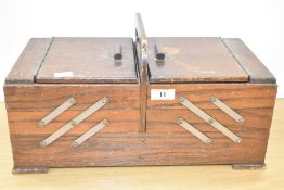 A vintage oak table top concertina sewing box on block feet, 14cm