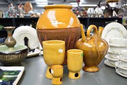 A large 20th century terracotta herb pot, decorated with yellow ochre glaze, 41cm sold together with
