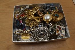 An assortment of costume brooches, including Monet, paste set examples and statement pieces etc