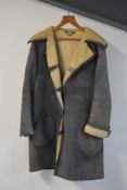 A 1960s Antartex shearling coat, made of Scottish lambskin, 3/4 length, having a warm grey taupe