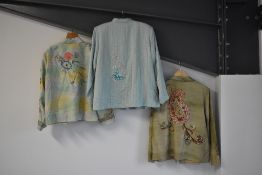 Three Indigo Moon embellished jackets. A black collarless jacketwith butterflies appliqued all