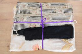 Two antique silk bedspreads. A Victorian quilt, in black silk, having a rectangular centre panel and