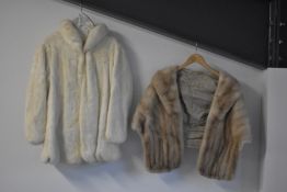 Four twentieth century National Fur Company garments, comprising three jackets or coats, one brown