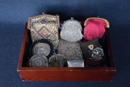 Eleven 19th and 20th century coin purses. Four clasp colure chain mail purses, ranging from 1.5x1.5'