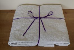 A 1960s-70s Cynthia Rowley Mandalay bedspread, in white cotton, having an all over floral quilting