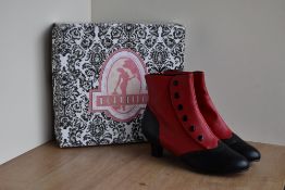 A pair of Bordello low heeled ladies boots in black and red leather, having perforated detail to the