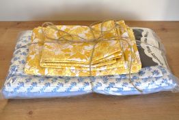 Two sets of midcentury bedlinen. A pair of pillow cases and a double top-sheet in cream cotton