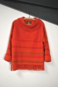An authentic 1960s Fjord Cliffs Lapp Lander Made In Scotland 100% virgin wool jumper in orange