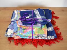 A quantity of various tablecloths and place settings, including a 1960s-70s cornflower floral