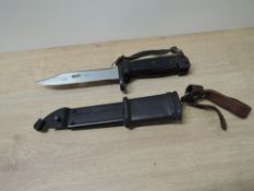 A Russian AK-47 Bayonet, no marks to blade, blade length 14.5cm, overall length 27cm with metal