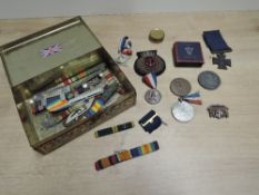 A tin of Medallions, Ribbons and Patches etc including two Baden Powell Medallions, 1919 Great War