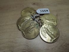 Five WWI Victory Medals named to 102877 PTE.W.L.FISHER.M.G.C, 11579 A.CPL.J.JONES.R.LANC.R, 4760