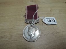 A George VI Army Long Service And Good Conduct Medal with fixed suspender and ribbon with Regular