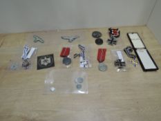 A collection of German WWI & WWII Medals, Badges and Patches, 1914 First Class Iron Cross, WWII