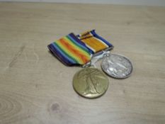 A WWI Medal Pair, War and Victory Medal both named to 2DG-5198 PTE.R.STANTON.2-D.GDS