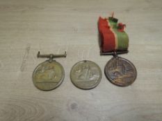 Three WWI Mercantile Marine War Service 1914-1918 Medals named to RONALD.M.HILL with suspender and